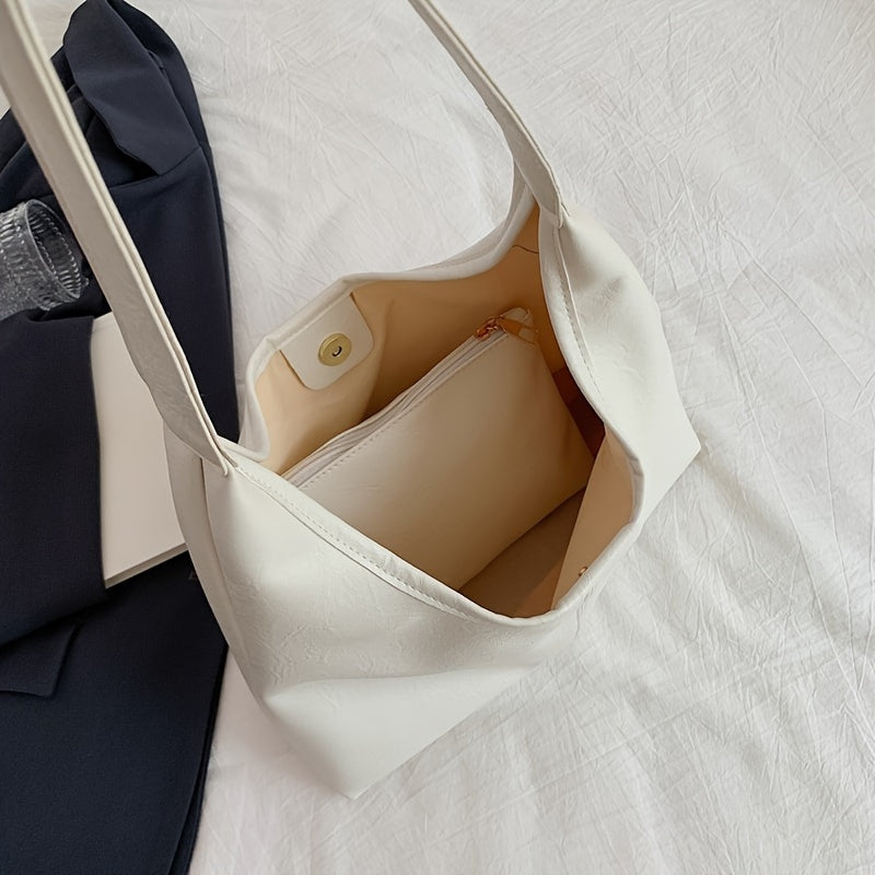 Um conjunto elegante e versátil de duas peças para mulheres, com uma bolsa de ombro macia e confortável e uma mala, perfeito para saídas casuais.