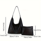 Um conjunto elegante e versátil de duas peças para mulheres, com uma bolsa de ombro macia e confortável e uma mala, perfeito para saídas casuais.